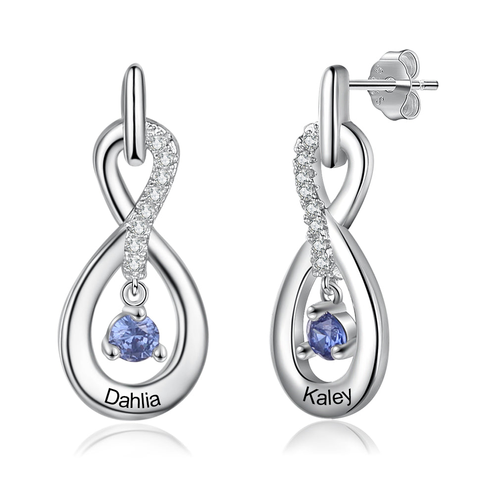 Sterling silver infinity earrings with round blue birthstone and personalized name engraving.