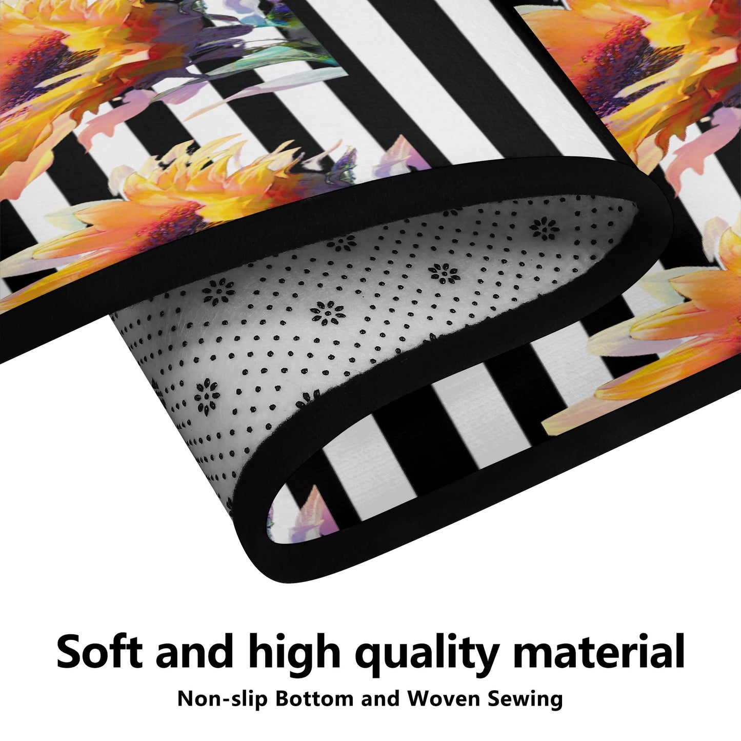 Rug with colorful floral design and black and white striped pattern on a white background
