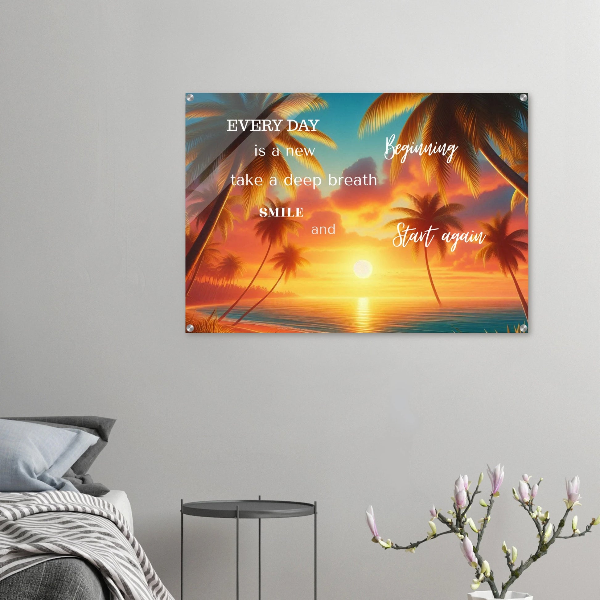 Decorative wall poster with sunset design and motivational text in a bedroom setting.