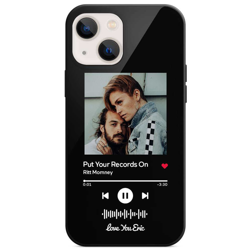 Black phone case displaying a couple and music player screen.
