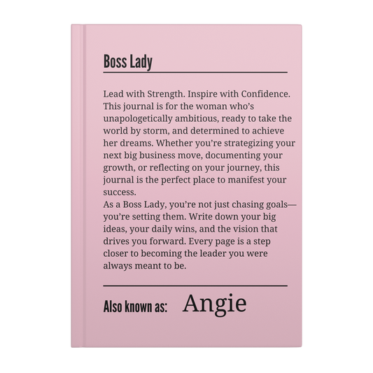 Pink hardcover Boss Lady journal with inspirational text about strength and leadership on the cover.