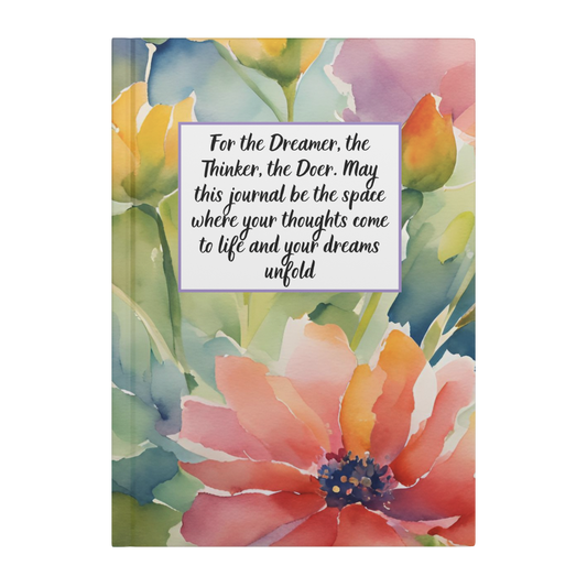 Journal with large watercolor flowers and quote about dreams and thoughts on white label.