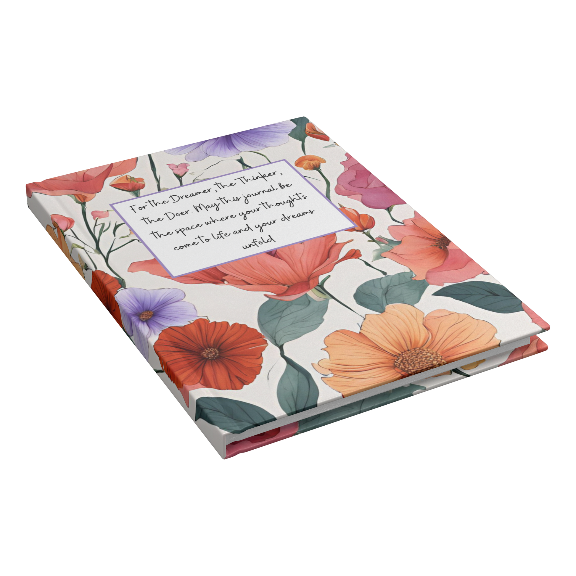 Notebook with colorful floral cover and motivational quote on front in elegant script.