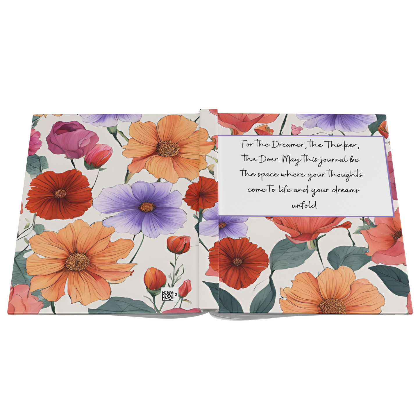 Notebook with colorful orange, red, and purple floral cover and inspirational quote on the inside page.