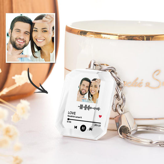 Personalized crystal keychain with a couple's photo, scannable code, and key ring.