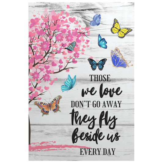 Memorial canvas wall art with pink heart-shaped tree and colorful butterflies on whitewashed wood background, comforting.
