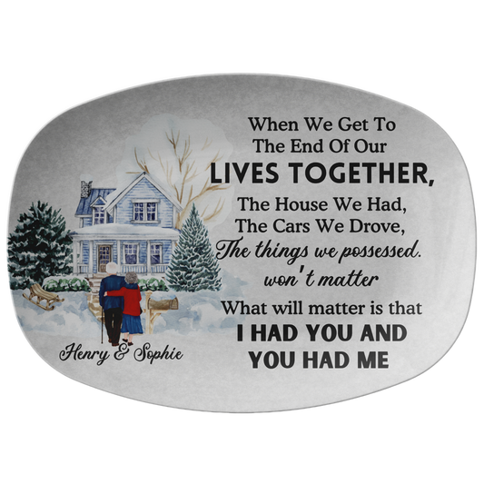 Rectangular gray platter with snowy house and leafless tree illustration and sentimental black text about lives together.