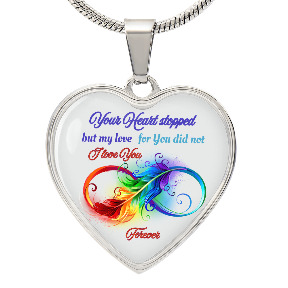 Silver heart-shaped pendant with colorful infinity feather and sentimental love inscription.