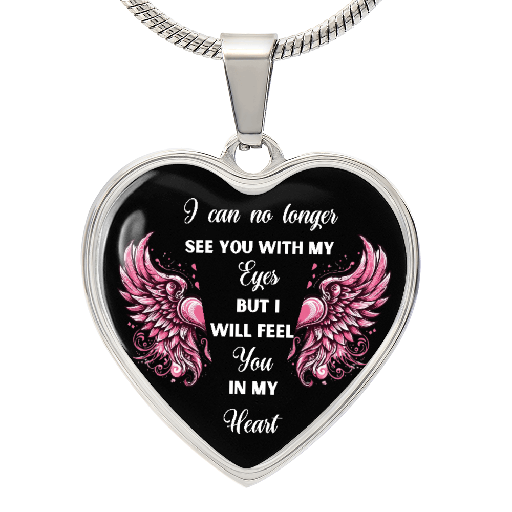 Silver heart-shaped pendant necklace with black background, pink angel wings, and white sentimental text.