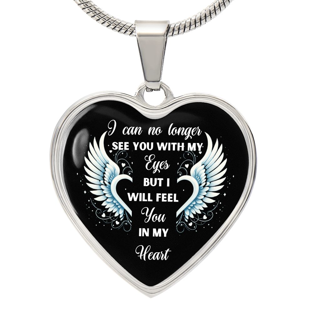 Silver heart-shaped necklace pendant with white angel wings and heartfelt sympathy quote on black background.