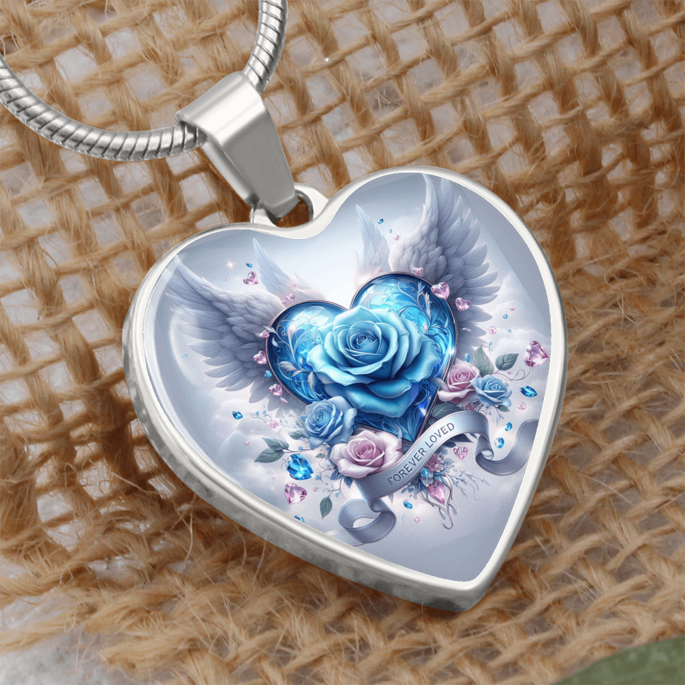 Silver heart pendant necklace featuring a blue rose with angel wings and small pink roses inside.