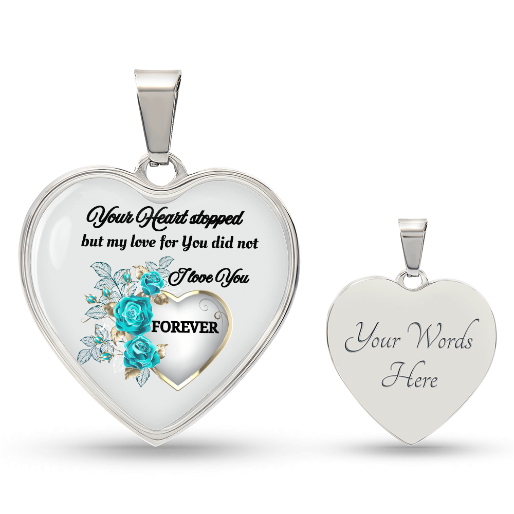 Silver heart-shaped pendant necklace with blue roses and scripted memorial message on front, personalized text on back.