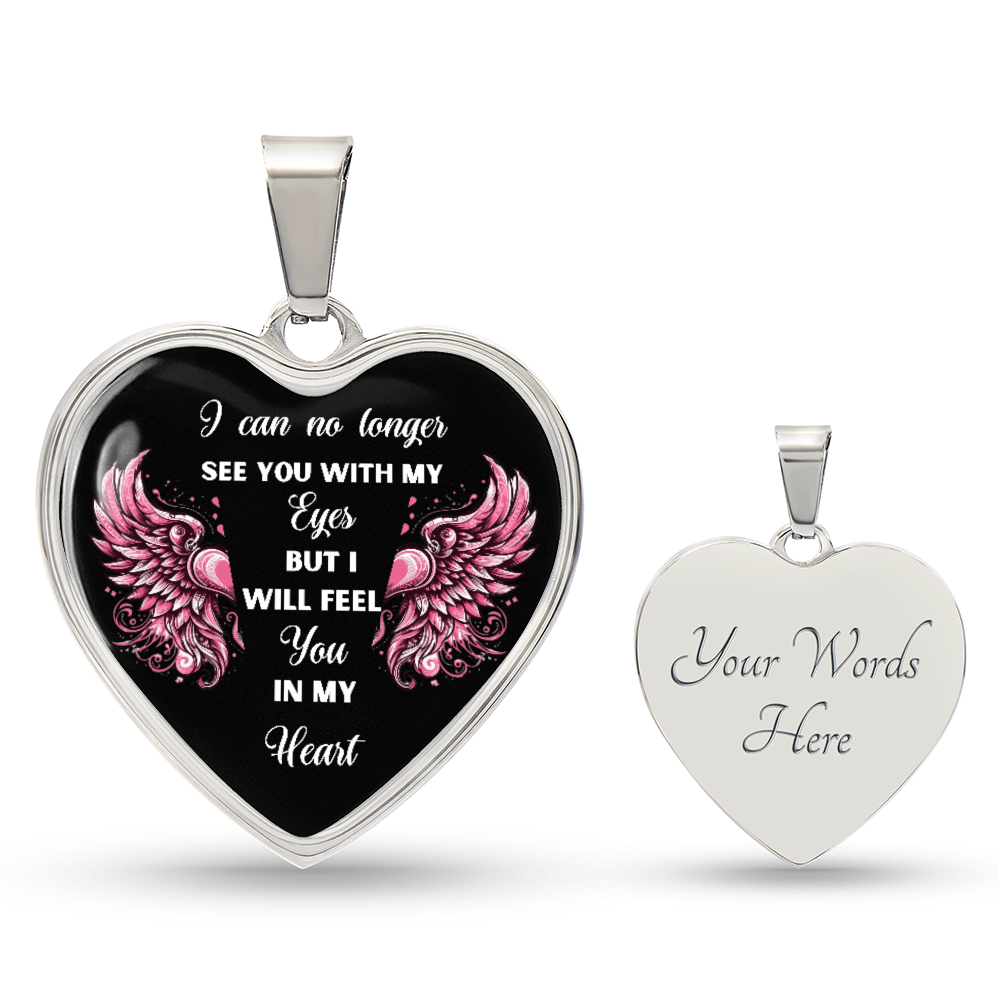 Silver heart-shaped pendant necklace with pink wings and sentimental quote on black background, engraved customizable back.