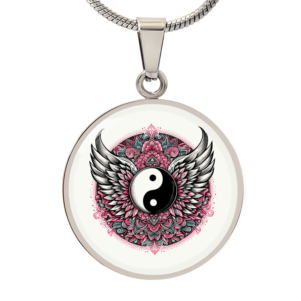 Silver circle necklace pendant featuring black and white yin yang symbol with detailed angel wings and pink floral mandala.