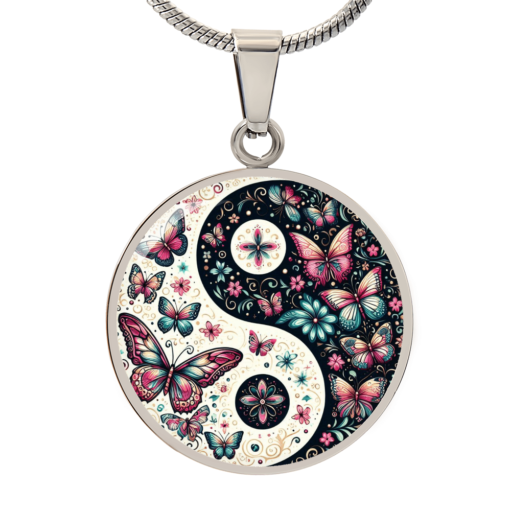 Yin yang pendant necklace with butterflies and floral design.