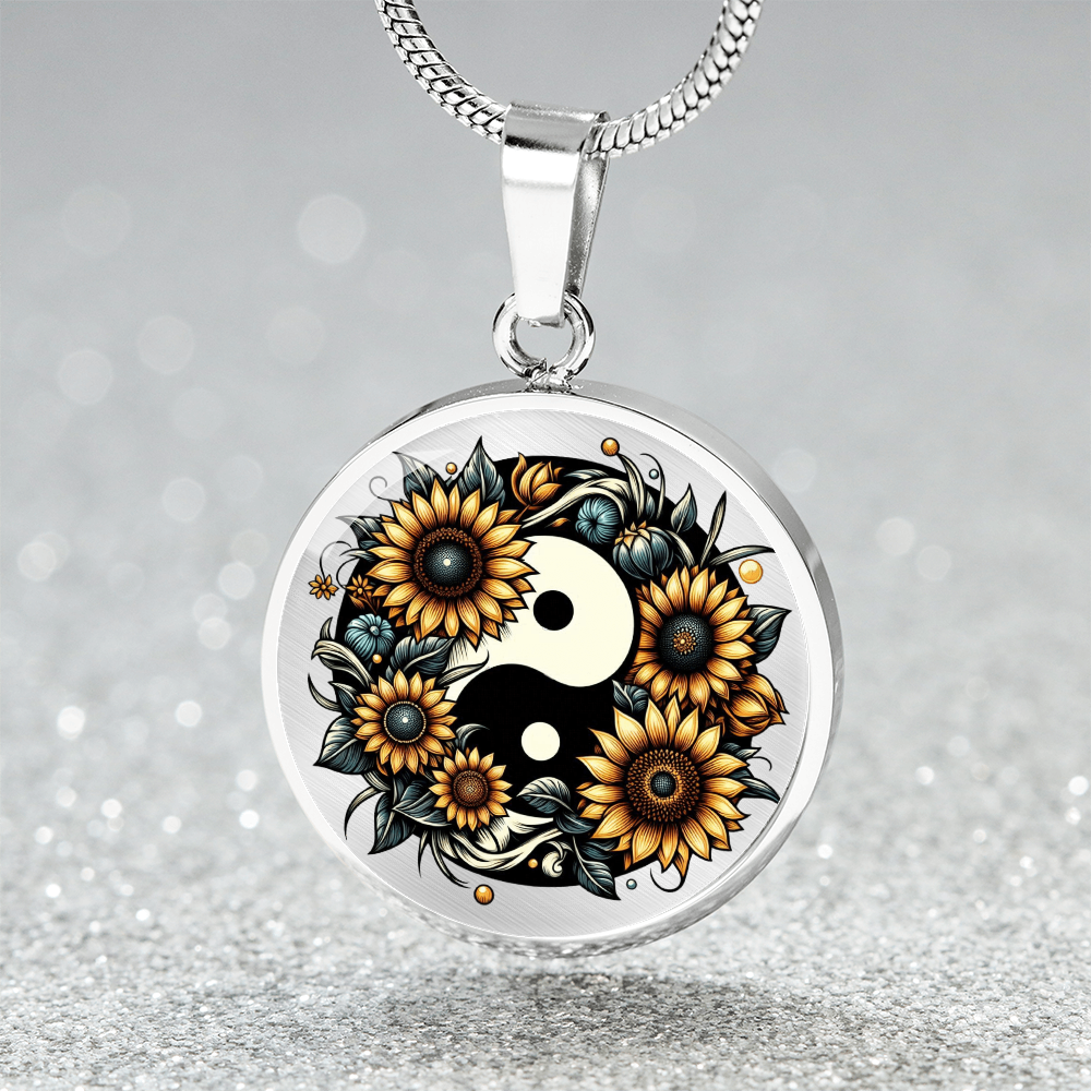 Silver circle necklace pendant featuring a yin yang symbol surrounded by detailed sunflowers and leaves.