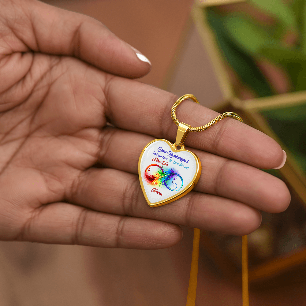 Gold heart pendant necklace with colorful infinity symbol and sentimental engraved text.