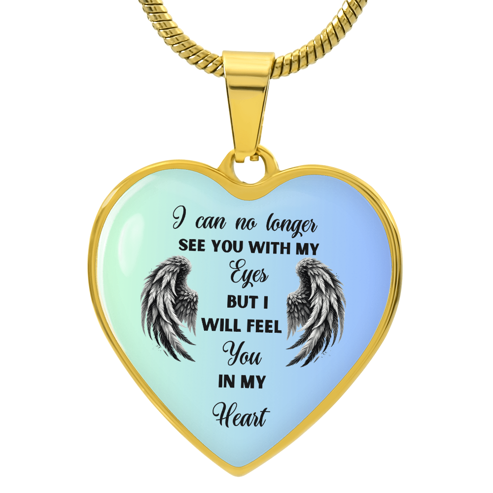 Heart-shaped necklace with a gold chain.