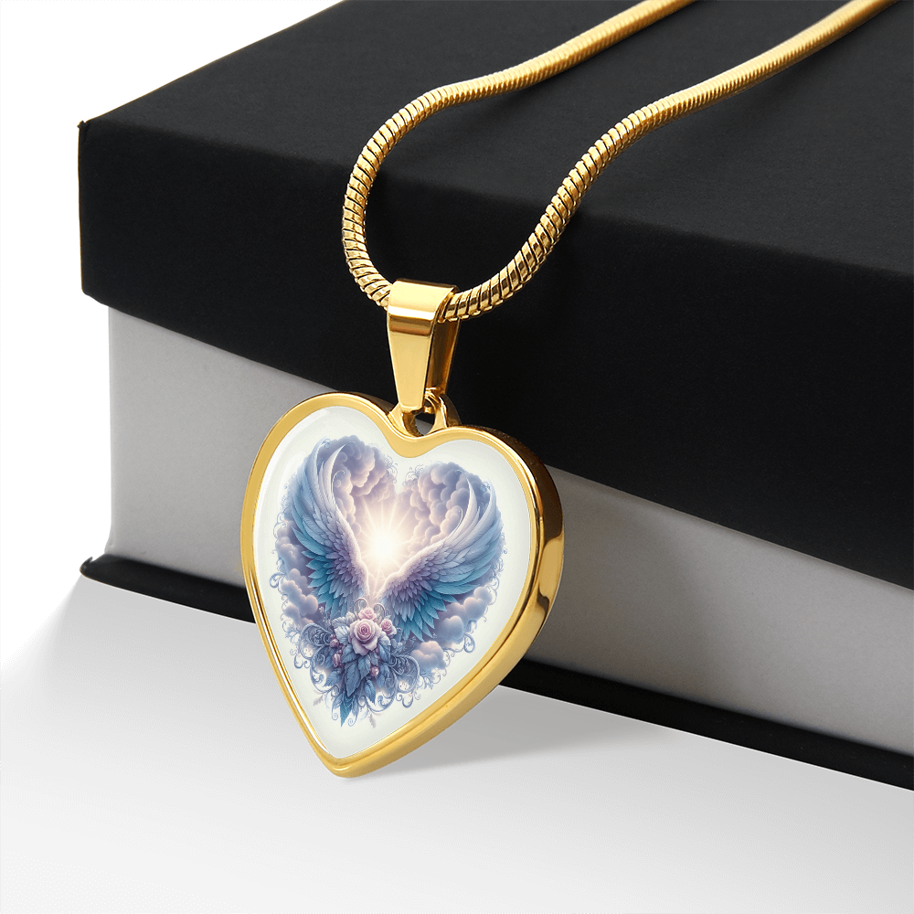 Gold heart-shaped pendant necklace with angel wings and floral graphic on white background.