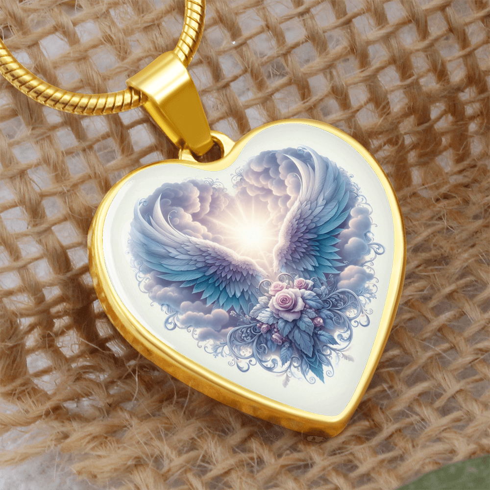 Gold heart-shaped pendant necklace featuring angel wings and a glowing heart design with roses.
