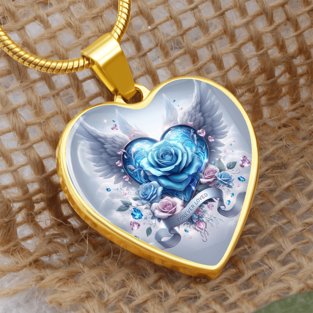 Gold heart pendant necklace with angel wings, blue rose, and delicate floral details.