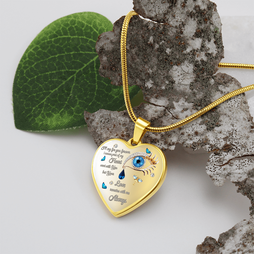 Gold heart-shaped necklace pendant with blue eye graphic and engraved "I'll cry for You forever" text.