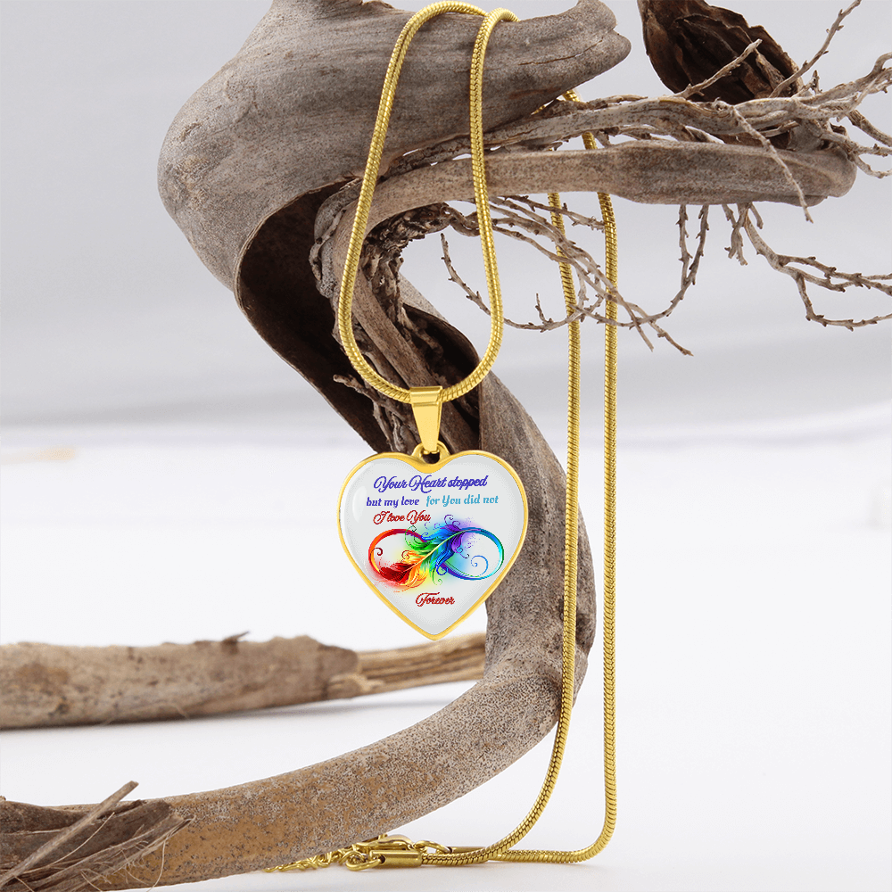 Gold heart-shaped pendant necklace with colorful "Your Heart Stopped but My Love for You Did Not" memorial design.
