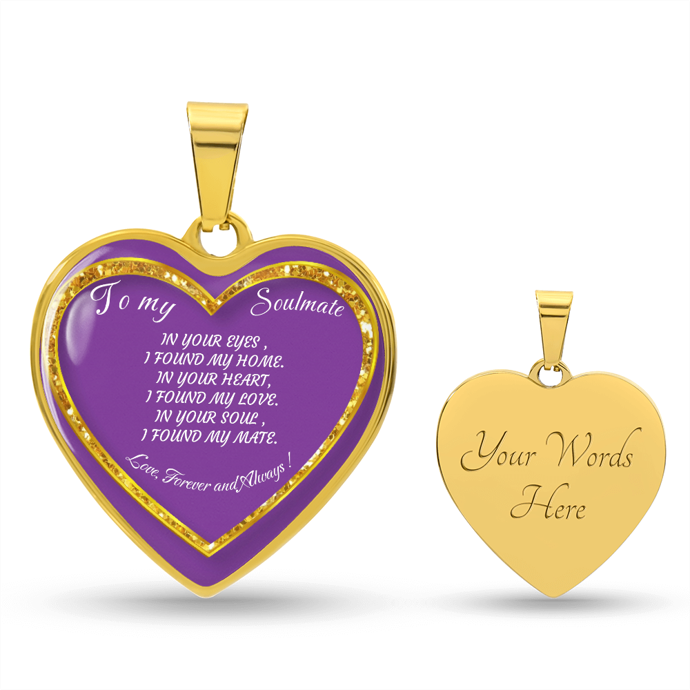 A golden heart-shaped pendant with a purple inlay and engraved message alongside a second golden heart-shaped pendant engraved with the words "Your Words Here".