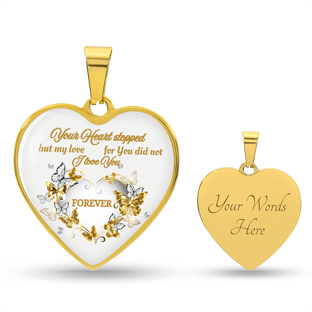 Gold heart pendant necklace with engraved sentimental message and butterfly design on front, smooth back engraving area.