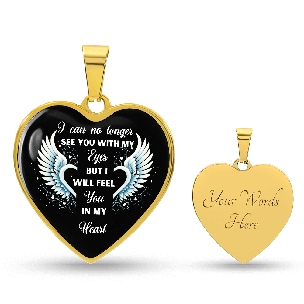 Gold heart-shaped memorial necklace with angel wings and sentimental engraved quote on black background, polished back with.