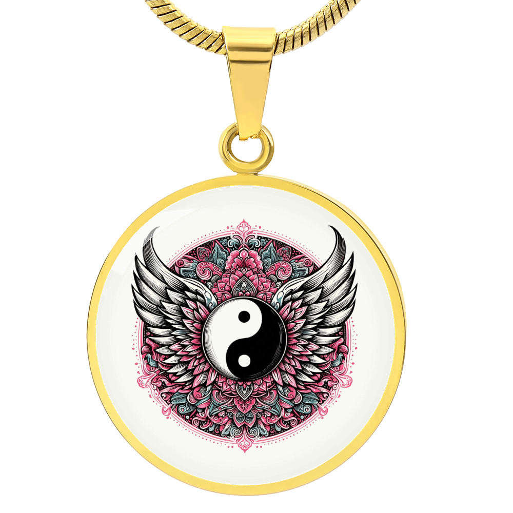Gold circular pendant necklace featuring yin yang symbol with black and white angel wings on a pink floral mandala background.