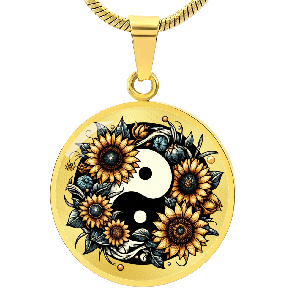 Gold circle pendant necklace with yin yang symbol surrounded by detailed sunflowers and leaves.