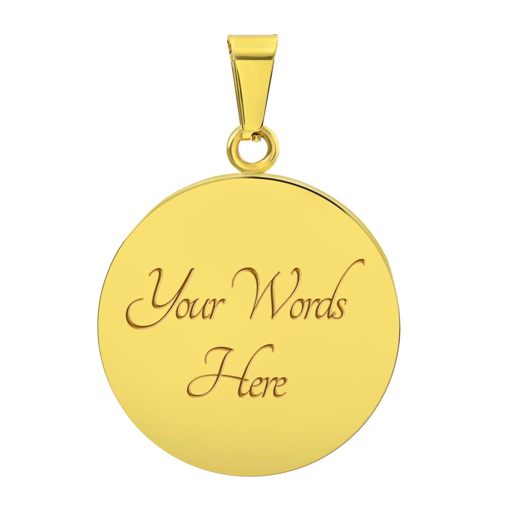Gold pendant with customizable text.