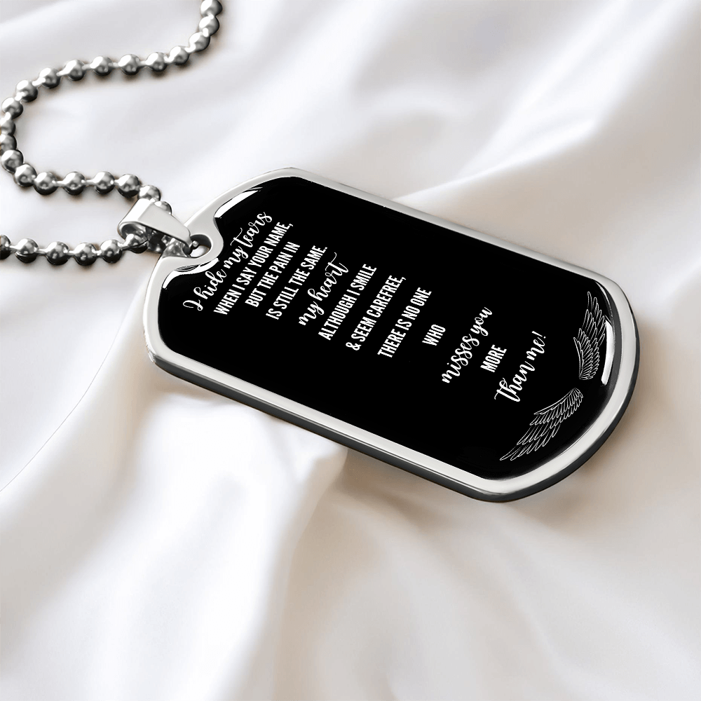 Black military-style dog tag necklace with heartfelt engraved grief message in white font on silver ball chain.