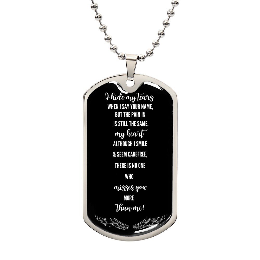 Black military dog tag necklace with silver ball chain and white engraved sentimental grief message.