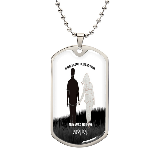 Silver military tag necklace with silhouette of soldier and angel, engraved remembrance quote.
