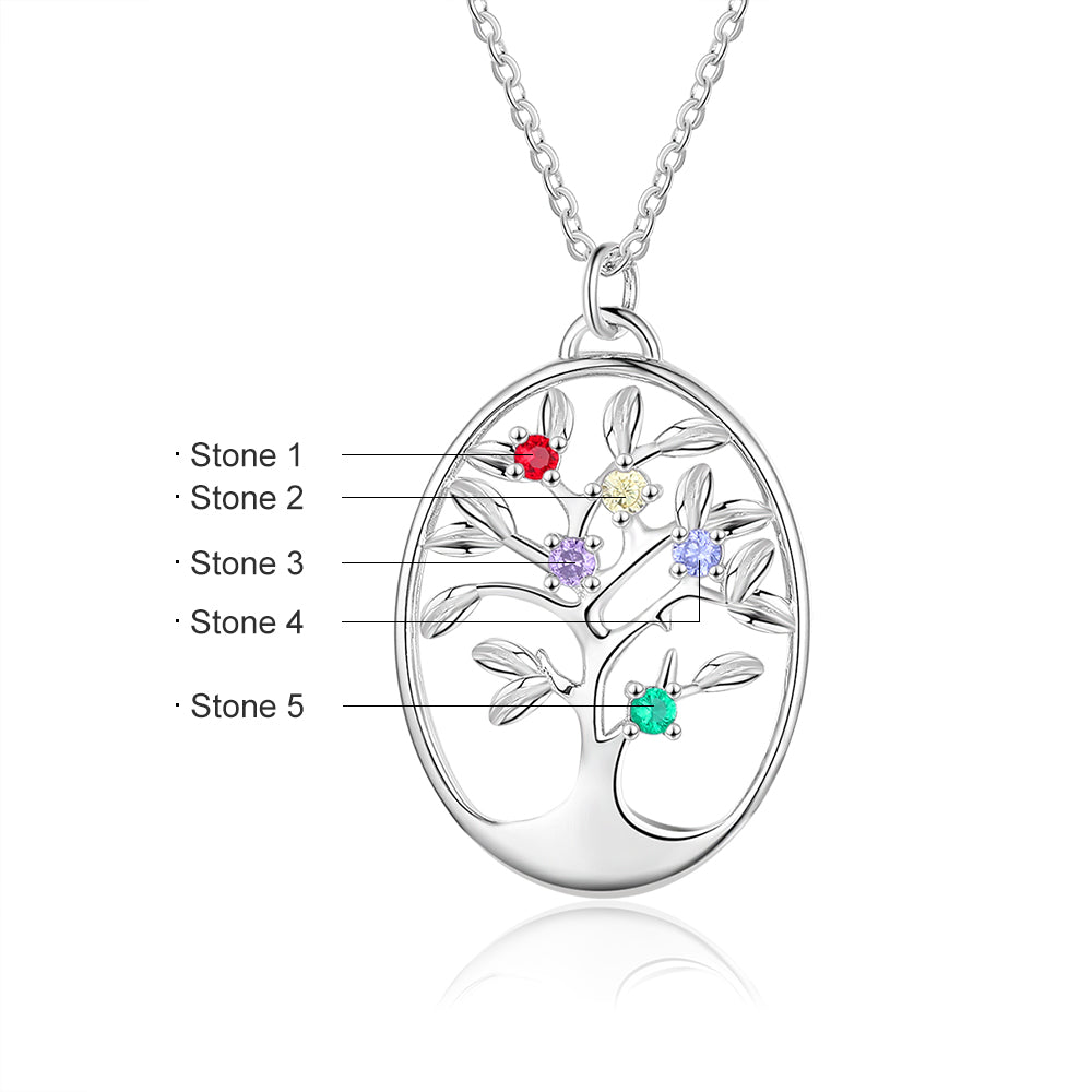 Oval silver necklace pendant shaped like a tree with five colorful birthstone accents on branches.