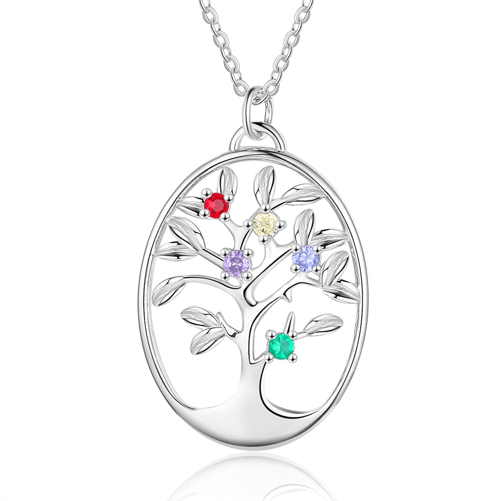 Silver oval pendant necklace with a detailed tree design and five multicolored gemstone accents.