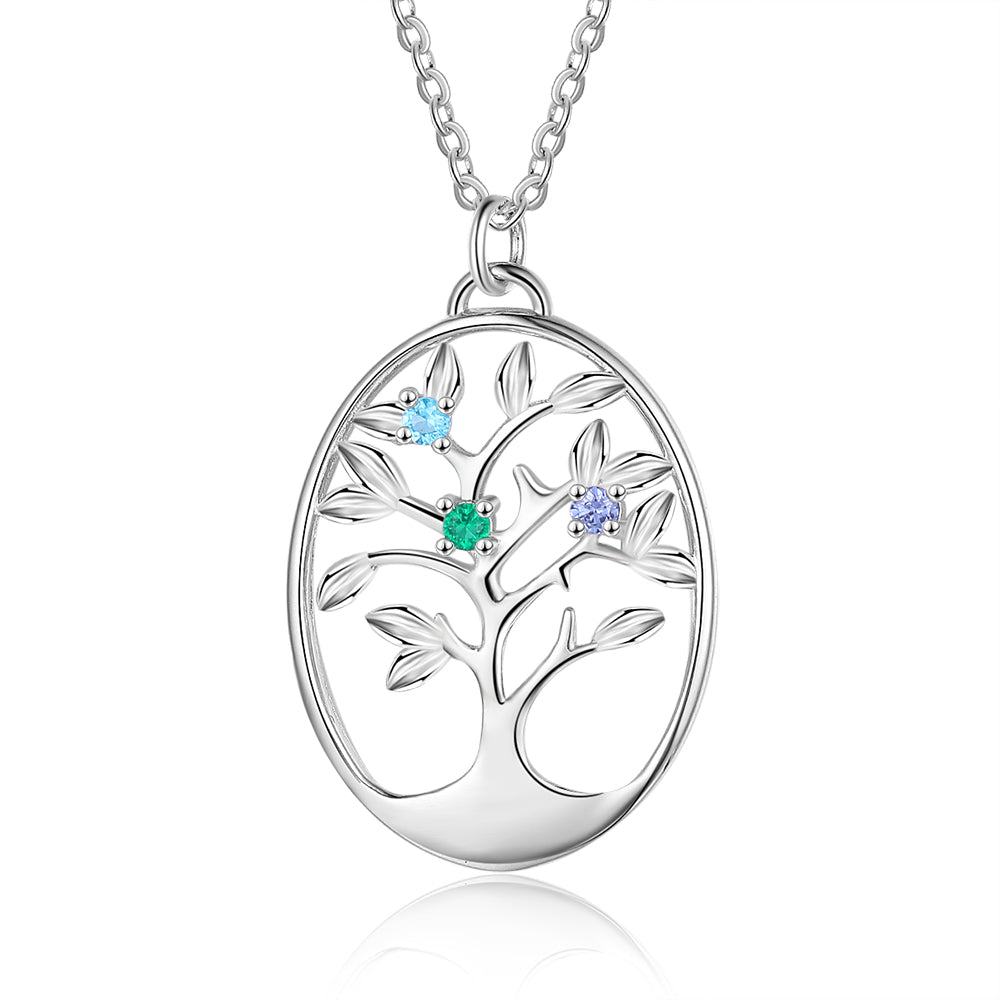 Silver oval pendant necklace featuring a tree design with three colorful gemstone accents.