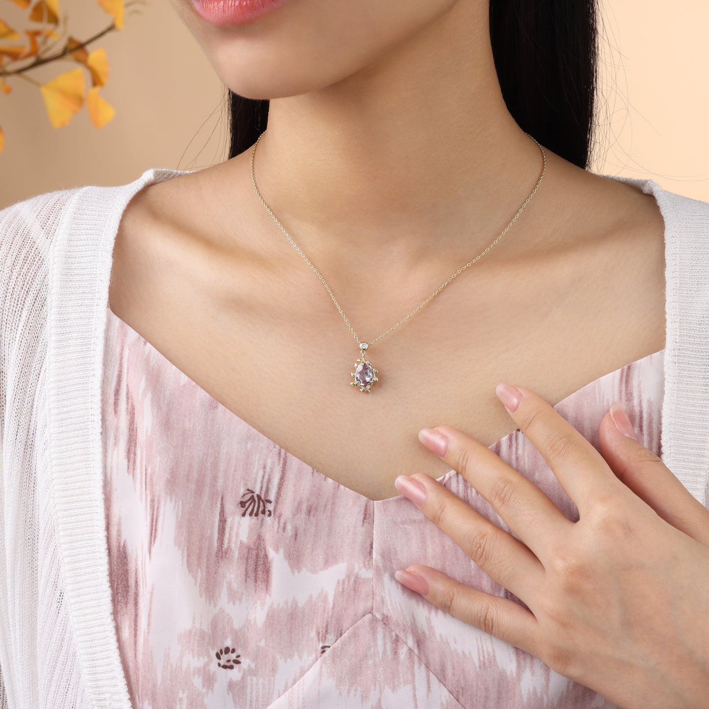 925 Sterling Silver Lab Alexandrite Necklace with pear-shaped purple gemstone on a delicate chain worn by a woman