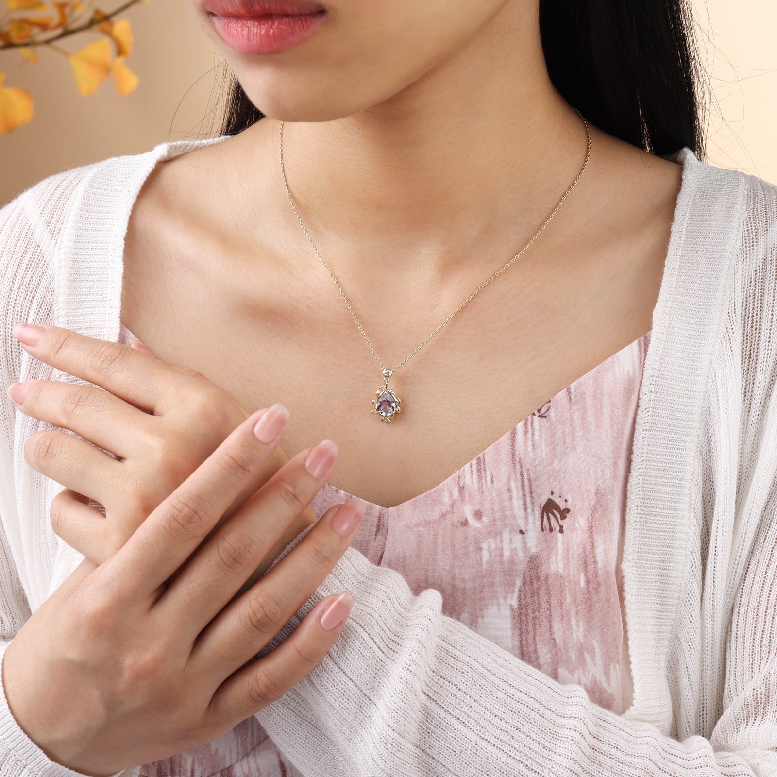 925 Sterling Silver Lab Alexandrite Necklace with pear-shaped purple gemstone on delicate chain worn by woman