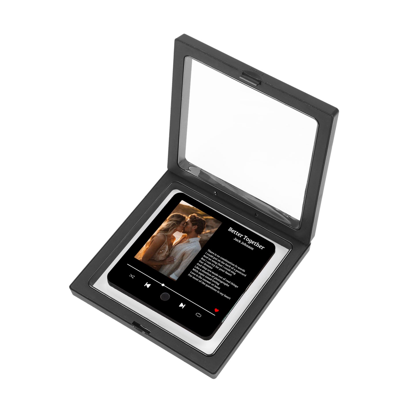 A black keepsake box displaying a mock-up of a music player with a kissing couple and song lyrics.