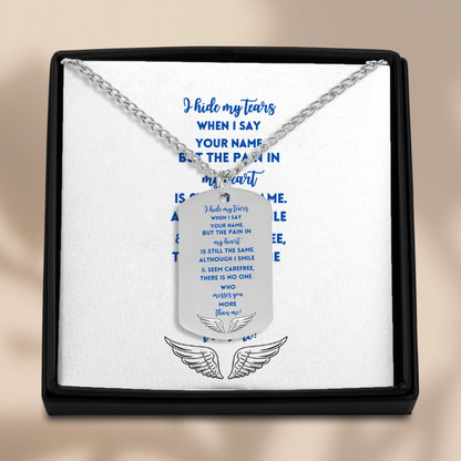 Silver steel engraved dog tag necklace with sentimental memorial message on card and angel wings design in black gift box.