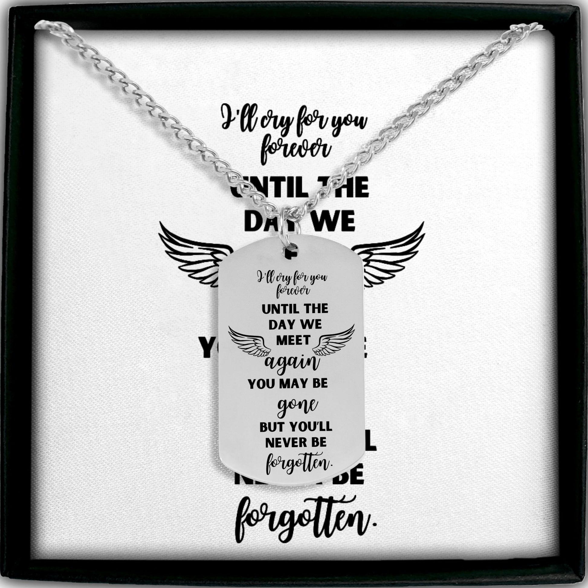 Silver steel memorial dog tag necklace with engraved heartfelt message and wings design on white background.