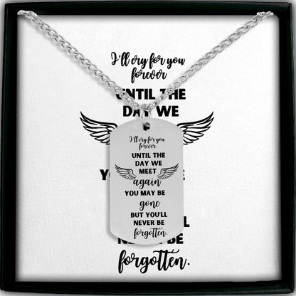 Silver steel memorial dog tag necklace with engraved heartfelt message and wings design on white background.