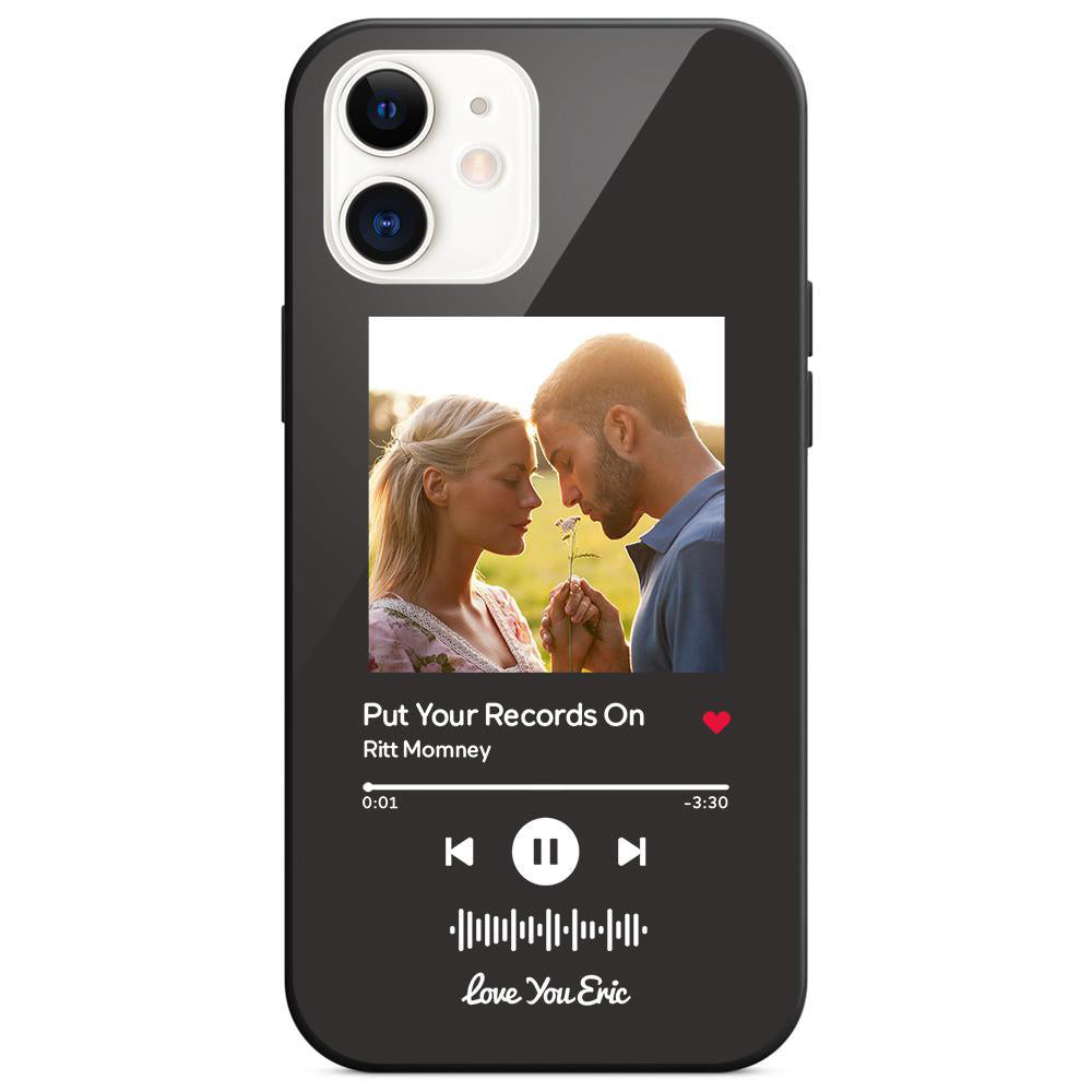 Black phone case with a photo of a couple holding a flower and music playing.