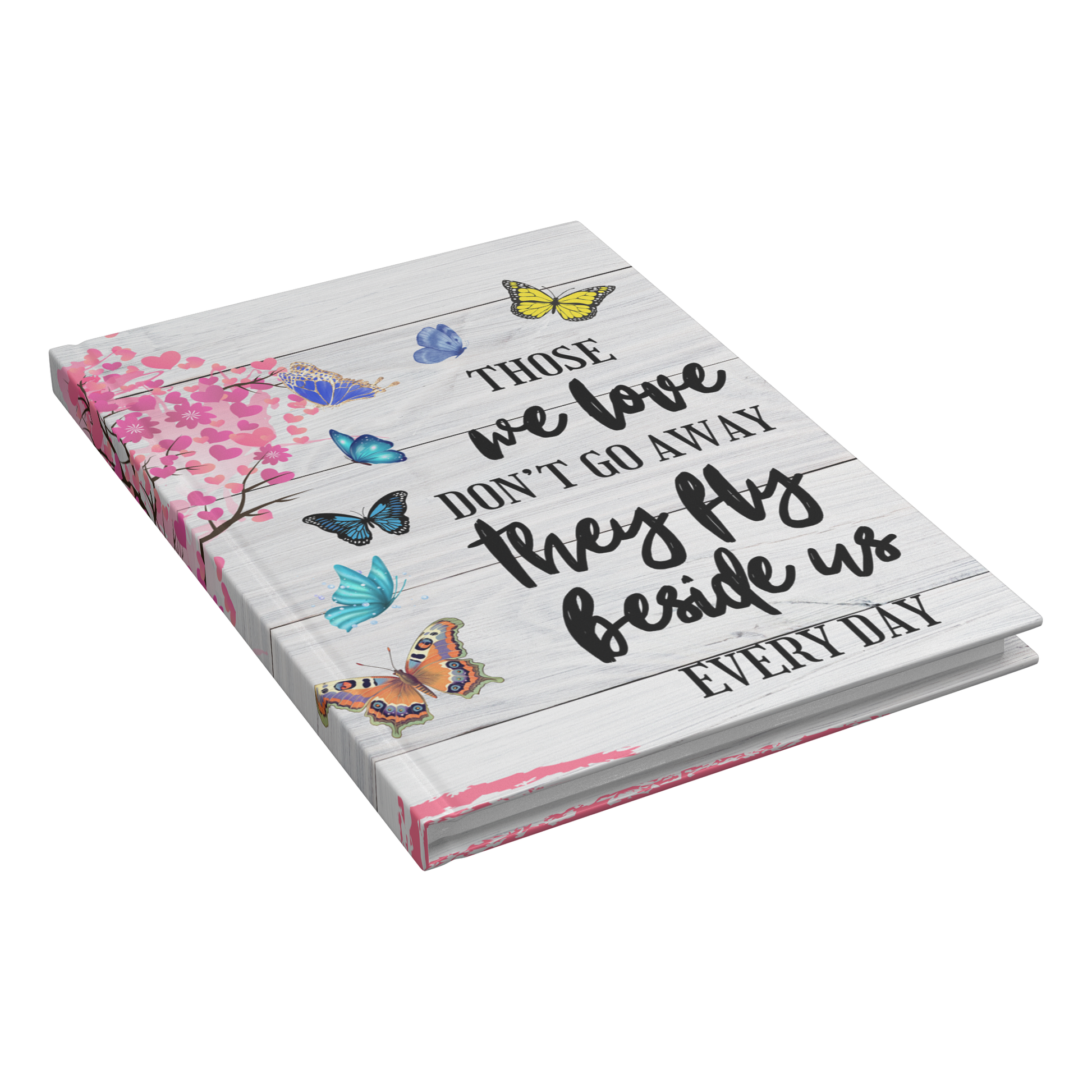 White wooden plank cover journal with black script, colorful butterflies, and pink floral spine design.