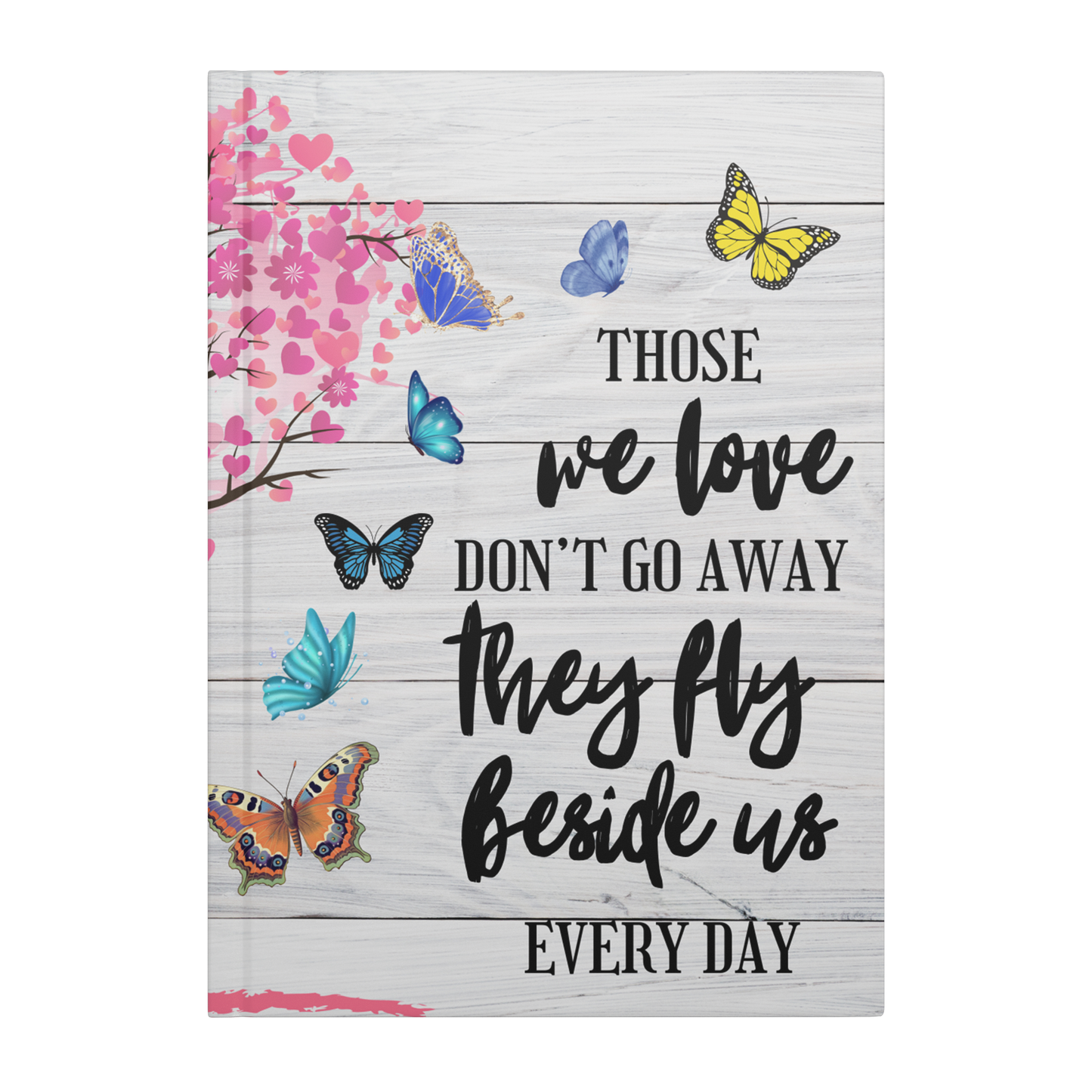 White wooden journal cover with colorful butterflies and pink heart blossoms, black script text "Those we love don't go.
