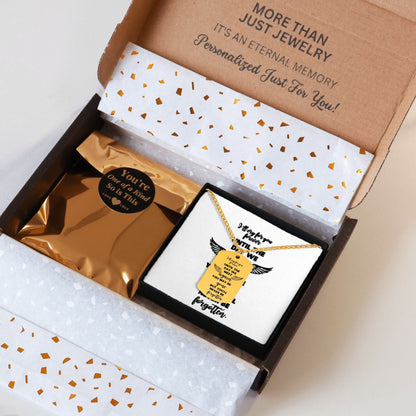 Black and gold memorial dog tag necklace displayed inside a branded jewelry gift box with sympathy message cards.